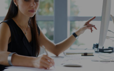 Woman taking notes in an office