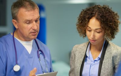 Doctor talking to nurse in a hospital